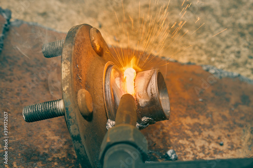 Bearings Housing Removal by Acetylene Cutting or Oxy Fuel Cutting Technique in Close Up View in Vintage Tone photo