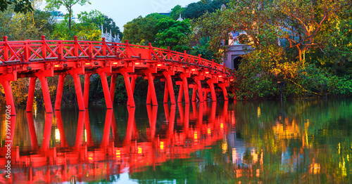 Fototapeta Naklejka Na Ścianę i Meble -  Iconic red bridge named The Huc on Hoan Kiem lake, center of Hanoi, Vietnam