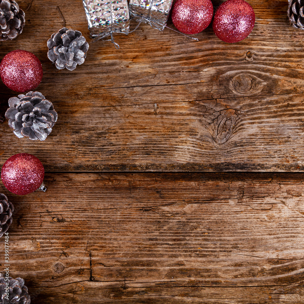 Christmas still life with balls and cones on a wooden background. Christmas still life with balls and cones on a wooden background.