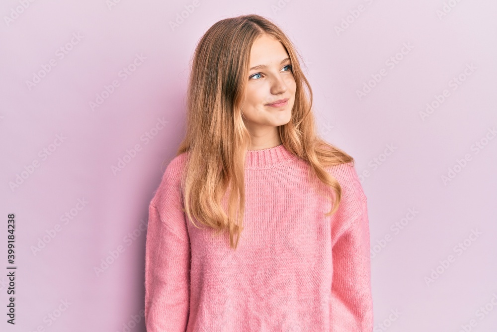 Beautiful young caucasian girl wearing casual clothes smiling looking to the side and staring away thinking. Beautiful young caucasian girl wearing casual clothes smiling looking to the side and staring away thinking.