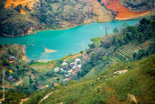 A ethnic minority house built in the rocky karst mountain range in Ha Giang, Vietnam. Ha Giang is a northernmost province in Vietnam. photo