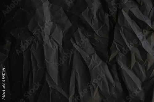 Crumpled black paper for background.