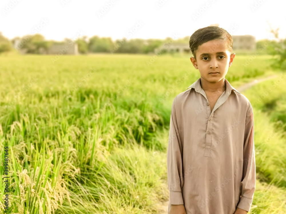a poor staring hungry orphan boy and sad expression on his face and his face and clothes are dirty and his eyes are full of pain a poor staring hungry orphan boy and sad expression on his face and his face and clothes are dirty and his eyes are full of pain