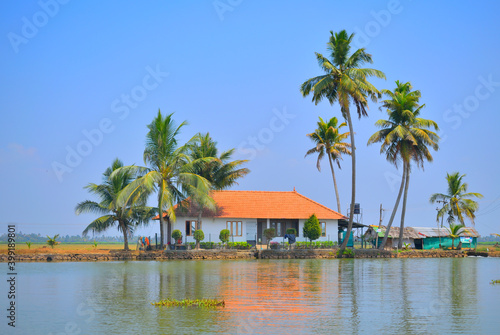 A house on the edge of a lake in Kerala backwaters near alleppey © saurav005