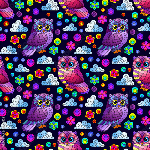Seamless pattern with a cute bright owls, flowers and clouds on a dark night sky background
