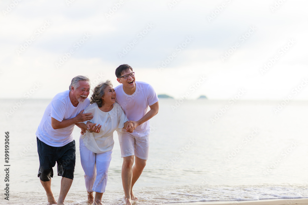 Happy family walking relax on the beach.