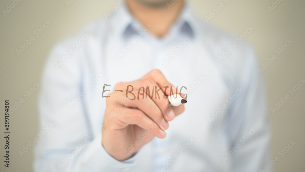 E-Banking , man writing on transparent screen E-Banking , man writing on transparent screen