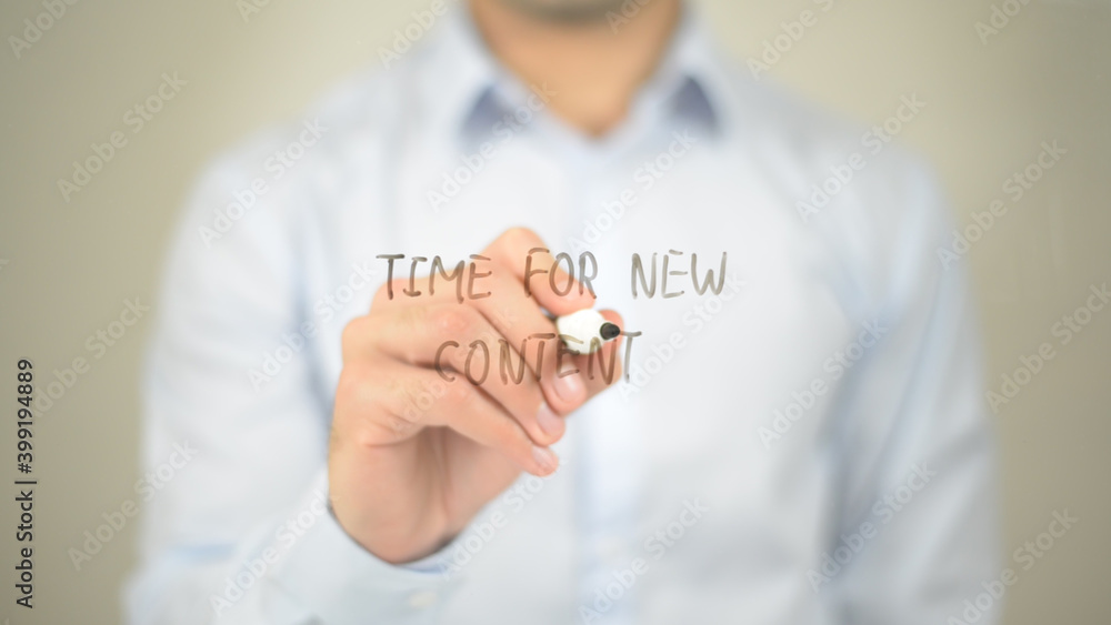 Time For New Content , man writing on transparent screen Time For New Content , man writing on transparent screen
