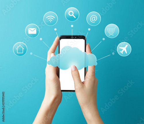 Woman holding mobile phone ...