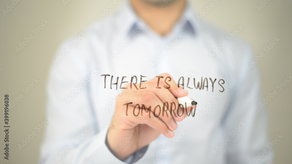 There is Always a Tomorrow, man writing on transparent screen There is Always a Tomorrow, man writing on transparent screen