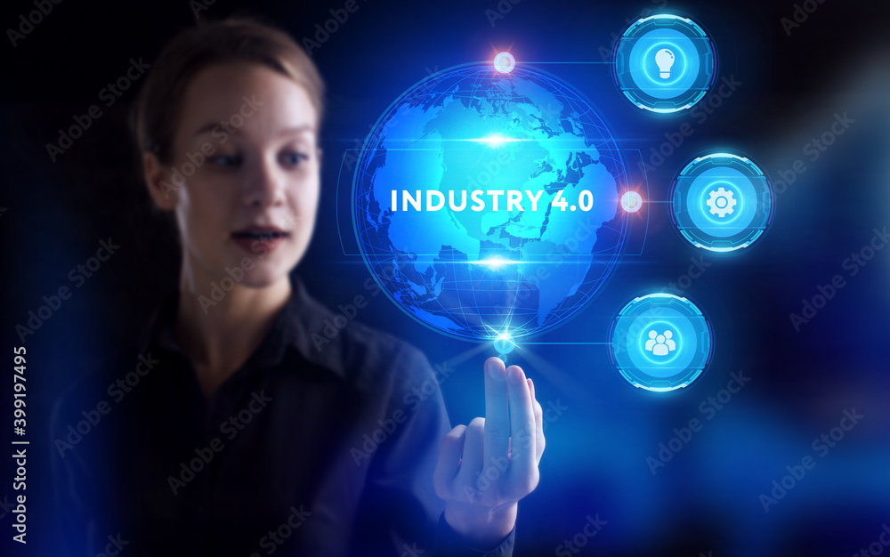 Business, Technology, Internet and network concept. Young businessman working on a virtual screen of the future and sees the inscription: Industry 4.0 Business, Technology, Internet and network concept. Young businessman working on a virtual screen of the future and sees the inscription: Industry 4.0