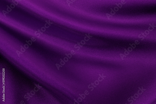 Purple fabric cloth texture for background and design art work, beautiful crumpled pattern of silk or linen.