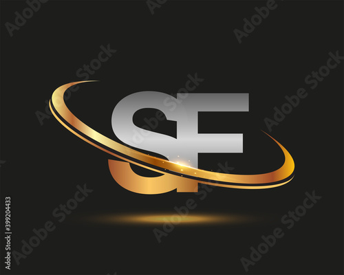 initial letter SF logotype company name colored gold and silver swoosh design. isolated on black background.