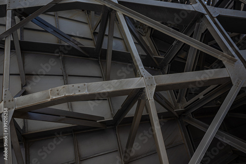 Rusty metal grilles, painted with silver paint, industrial premises, bolt screwed into the roof slab frame, radio signal dish