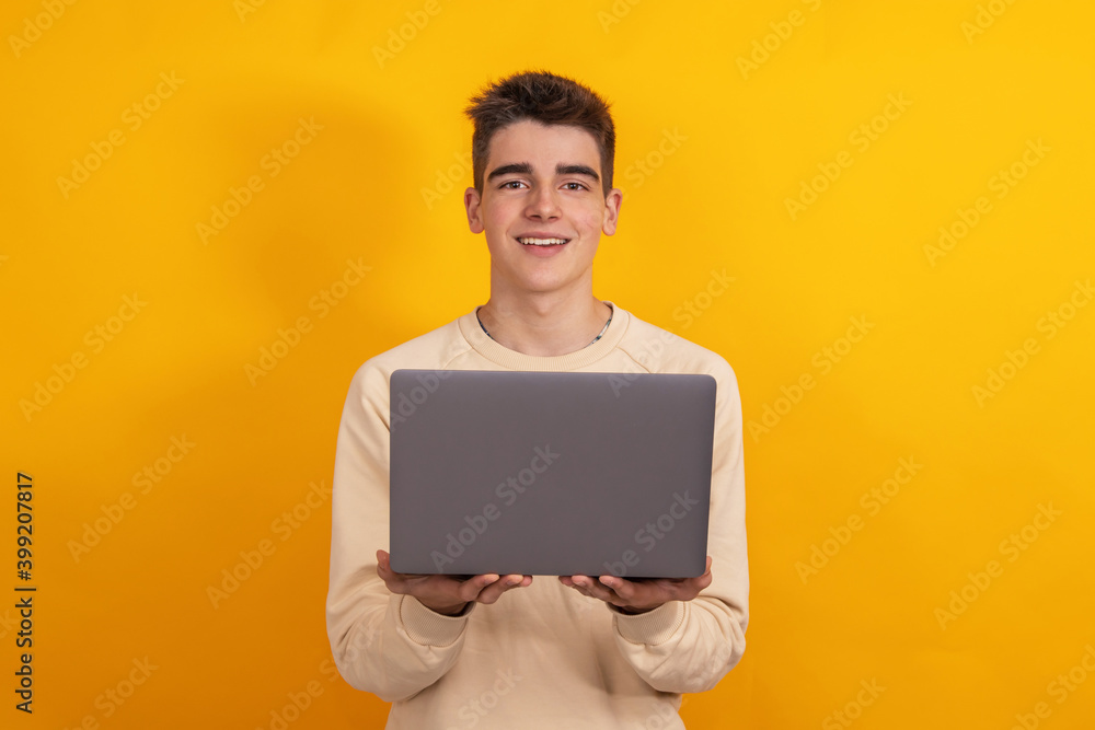 young student or teenager with laptop isolated on background young student or teenager with laptop isolated on background