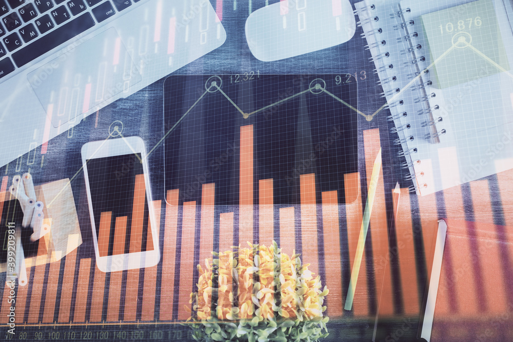 Double exposure of forex chart hologram over desktop with phone. Top view. Mobile trade platform concept. Double exposure of forex chart hologram over desktop with phone. Top view. Mobile trade platform concept.