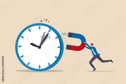Time management, control business time or work deadline concept, smart businessman using magnet to stop clock hand metaphor of time manipulation.