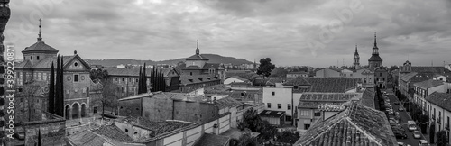 Panoramic view of several old buildings in the historic center of Alcalá de Henares. Black and white.