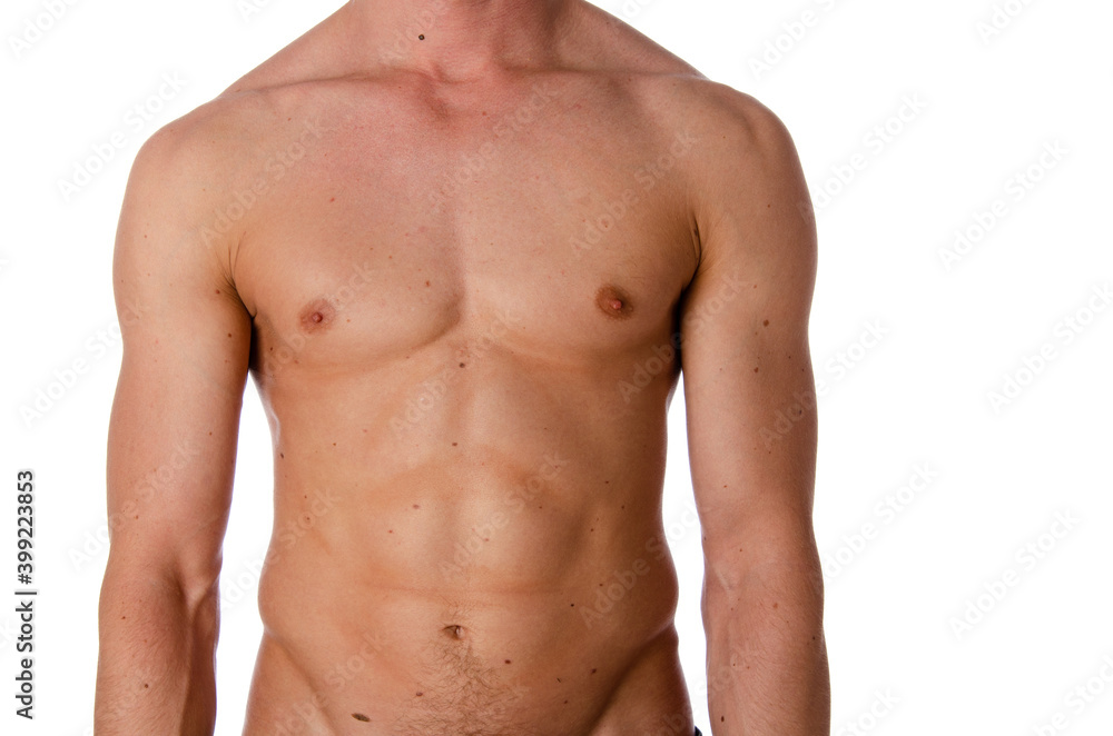 Fashion portrait of strong brutal guy with a modern trendy hairstyle. Sexy torso. Male flexing his muscles. Sport workout bodybuilding. Fashion portrait of strong brutal guy with a modern trendy hairstyle. Sexy torso. Male flexing his muscles. Sport workout bodybuilding.
