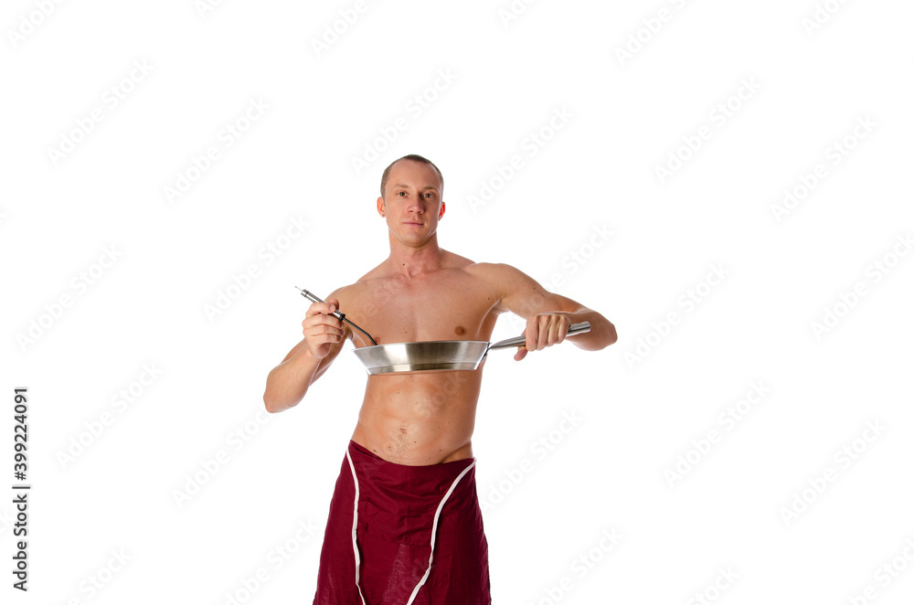 Sexy shirtless young chef or waiter posing, wearing black apron on naked body, isolated on white background. Sexy shirtless young chef or waiter posing, wearing black apron on naked body, isolated on white background.