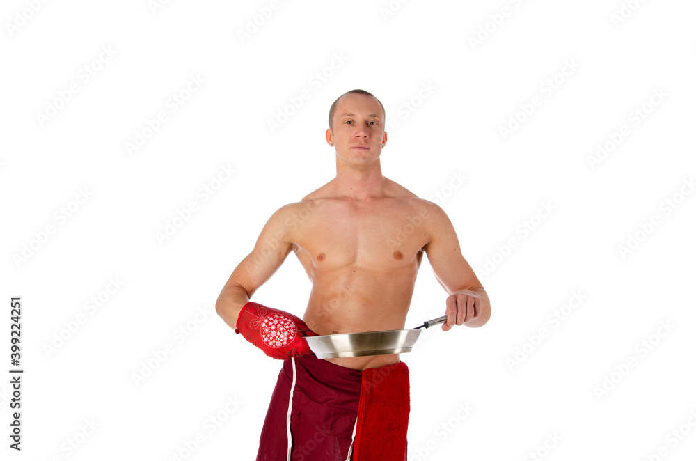 Fototapeta premium Sexy shirtless young chef or waiter posing, wearing black apron on naked body, isolated on white background.