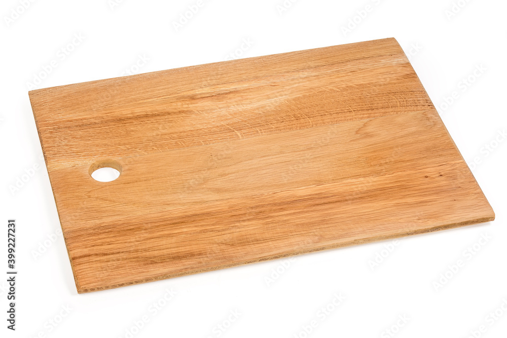 Rectangular natural oak wood cutting board on a white background