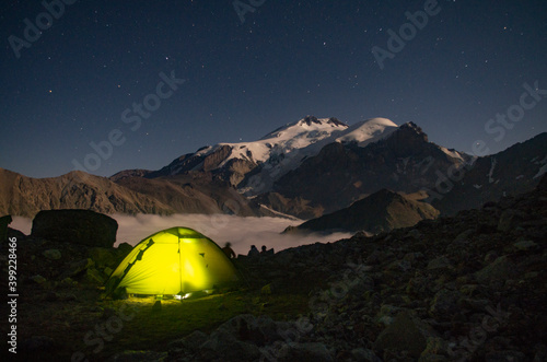 Night mountain landscape. Elbrus. Bivouac