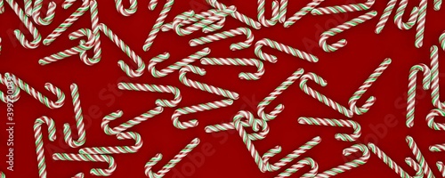 pile of Christmas candy canes scattered on the floor, panoramic view, on red background, minimalistic concept , flat lay, 3d render