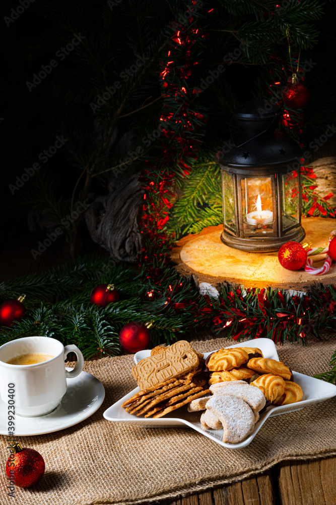 Different types of biscuits with rustic Christmas decorations