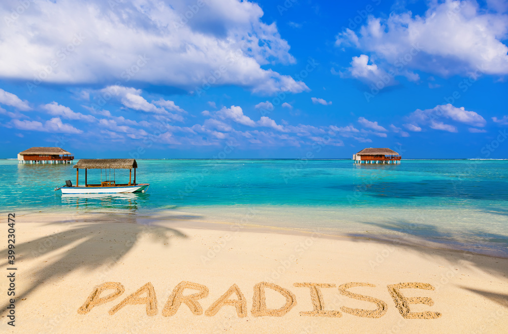Fototapeta premium Word Paradise on beach