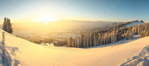 Fototapeta Naklejka Na Ścianę i Meble -  Beautiful Sunrise in snow mountains landscape. Amazing yellow Sunshine. Allgau, Mittag Mountain, Bavaria, Alps, Germany.