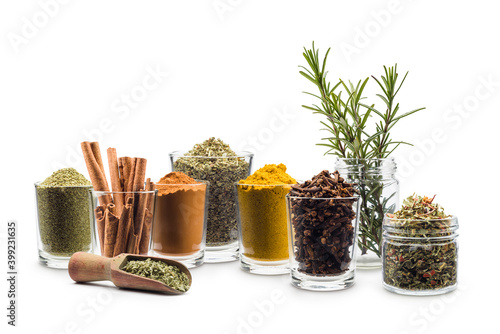 Fototapeta Naklejka Na Ścianę i Meble -  glass jars with various spices on white background