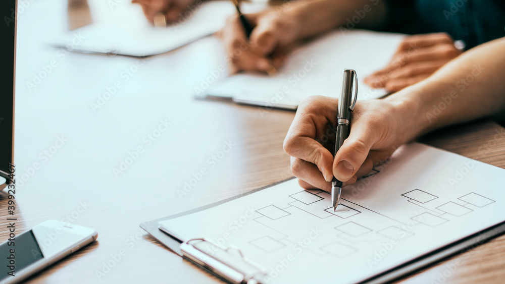close up. working group works with marketing schedules. close up. working group works with marketing schedules.