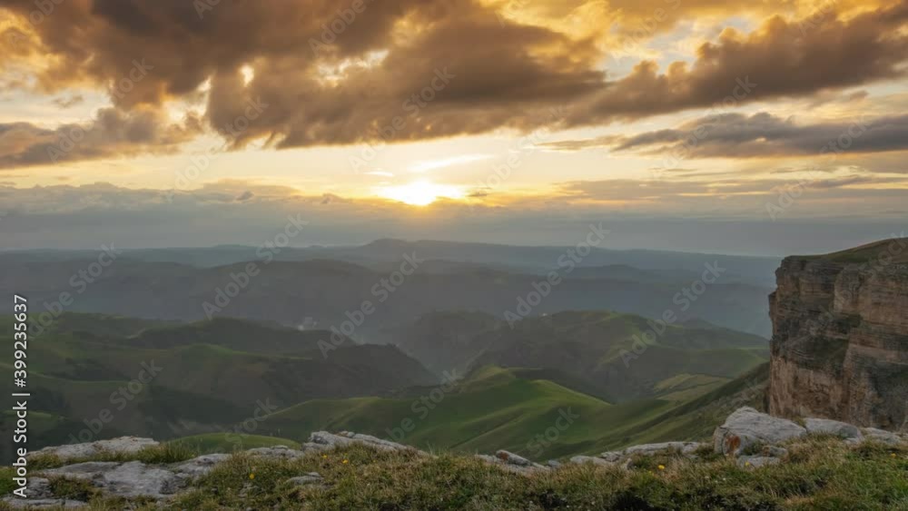 Beautiful panorama landscape of the sunbeams on hills in Caucasus mountains at sunset, plateau Bermamyt, Russia, timelapse 4k Beautiful panorama landscape of the sunbeams on hills in Caucasus mountains at sunset, plateau Bermamyt, Russia, timelapse 4k