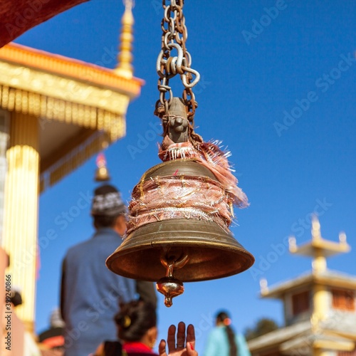 Bronze bell in Surkanda Devi Mandir Hindu temple photo