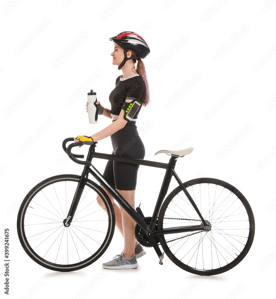 Obraz premium Female cyclist with bicycle and bottle of water on white background