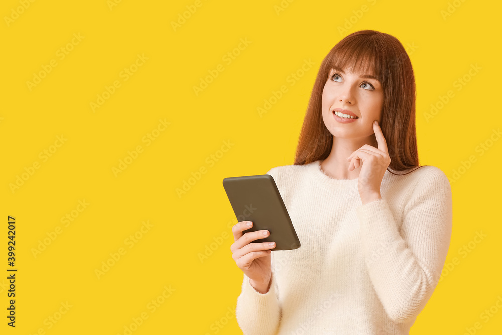 Young woman with e-reader on color background Young woman with e-reader on color background