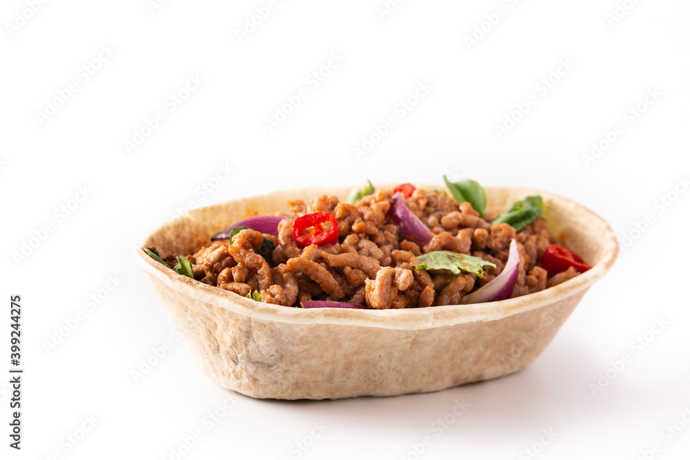 Mexican barquita taco with beef, chilli, tomato, onion and spices isolated on white background Mexican barquita taco with beef, chilli, tomato, onion and spices isolated on white background