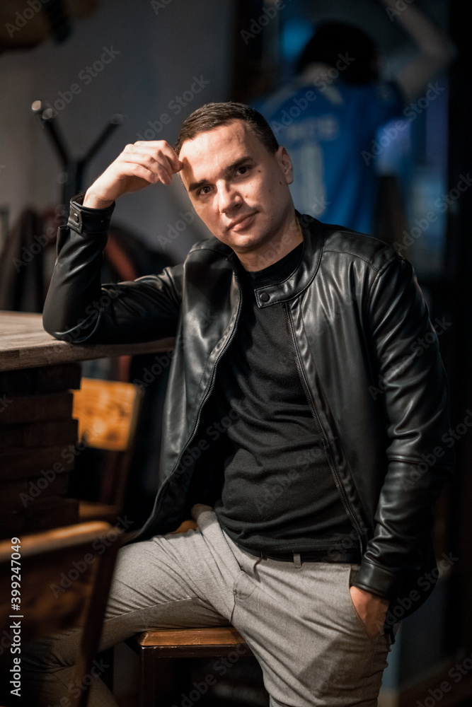 Portrait of a handsome young man. Shooting in a bar Portrait of a handsome young man. Shooting in a bar
