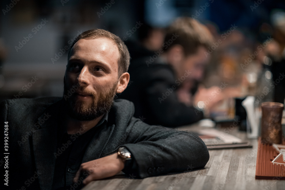 Portrait of a handsome young man. Shooting in a bar Portrait of a handsome young man. Shooting in a bar