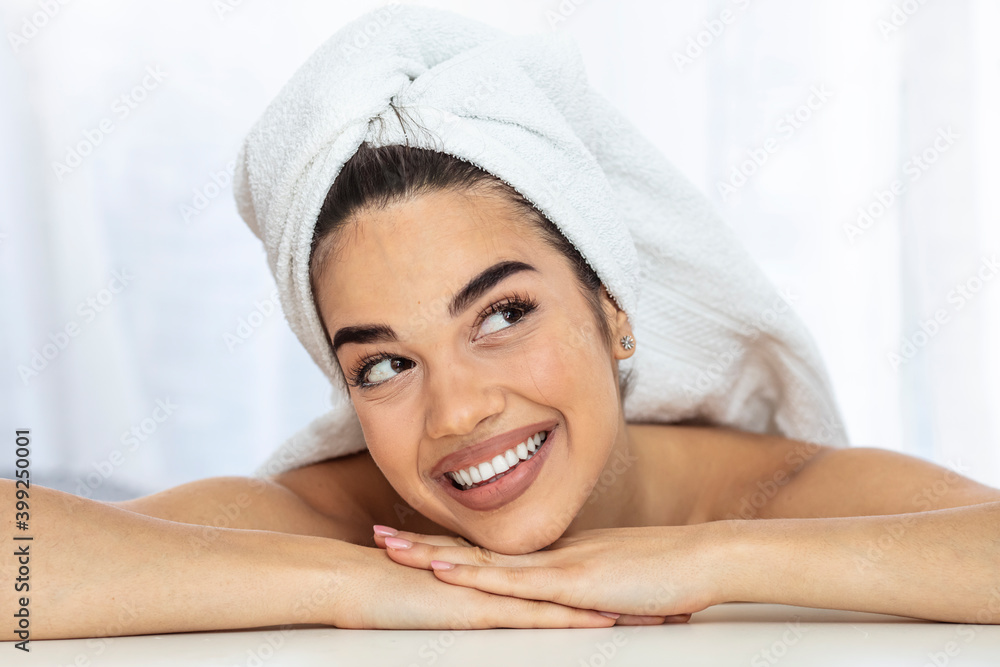 Skin care. Woman with beauty face touching healthy facial skin portrait. Beautiful smiling asian girl model with natural makeup touching glowing hydrated skin on white background closeup Skin care. Woman with beauty face touching healthy facial skin portrait. Beautiful smiling asian girl model with natural makeup touching glowing hydrated skin on white background closeup