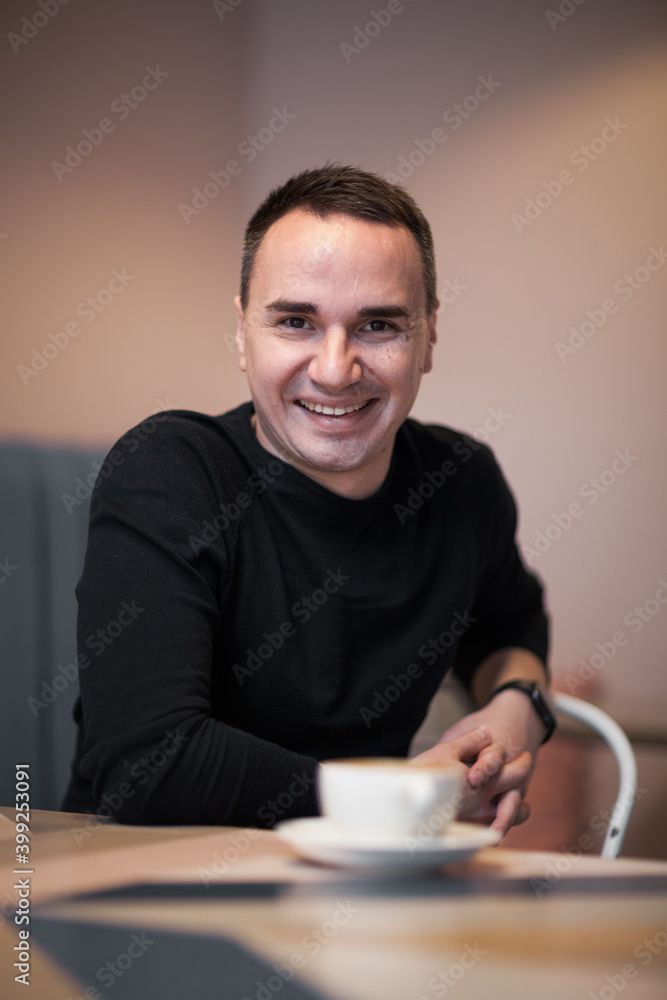 Portrait of a handsome young man. Shooting in the interior Portrait of a handsome young man. Shooting in the interior