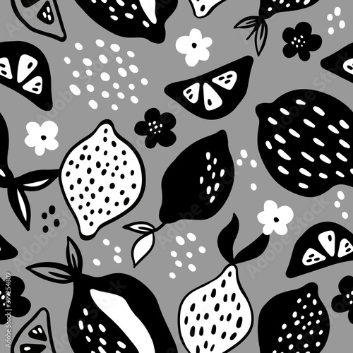 Hand drawn vector pattern of different decorative lemons. Graphic style lemons background. Fruit monochrome pattern for textile designs, cards and prints.
