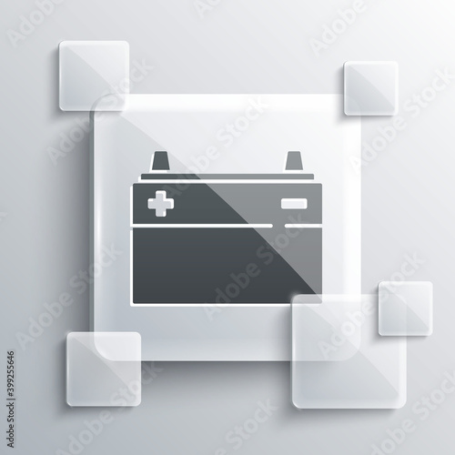 Grey Car battery icon isolated on grey background. Accumulator battery energy power and electricity accumulator battery. Square glass panels. Vector.