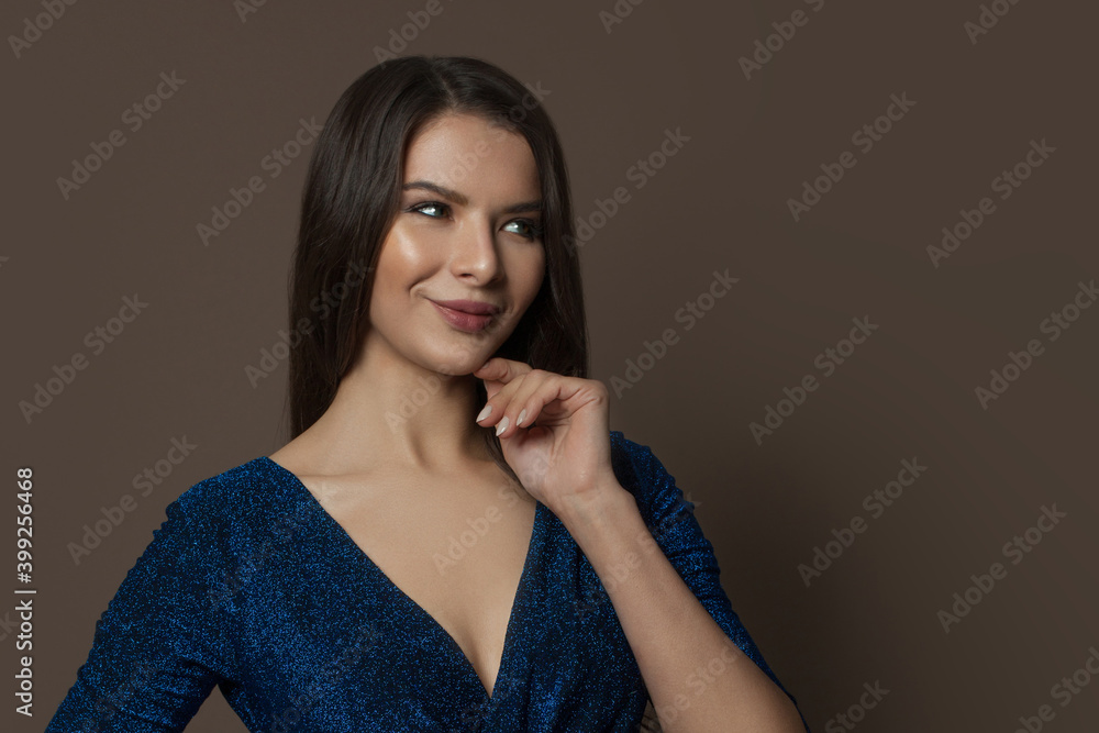Beauty fashion portrait of attractive woman smiling on brown background Beauty fashion portrait of attractive woman smiling on brown background