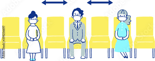 一定の距離をとって座席に座る人々