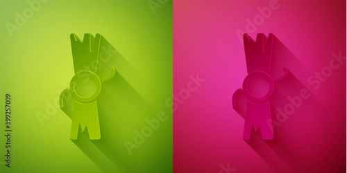 Paper cut Decree, paper, parchment, scroll icon icon isolated on green and pink background. Paper art style. Vector.