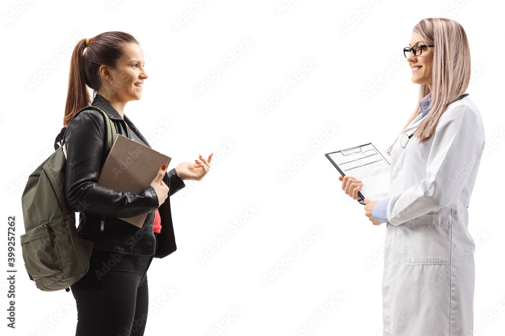 Smiling female doctor and a student having a conversation Smiling female doctor and a student having a conversation