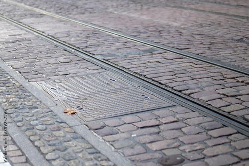 Tram lines in a cobbled city street in Freiburg