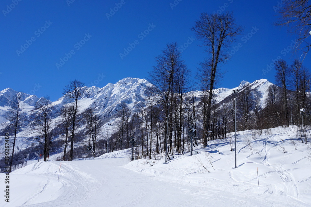 Winter landscape in the mountains of the Caucasian ridge, ski slopes.